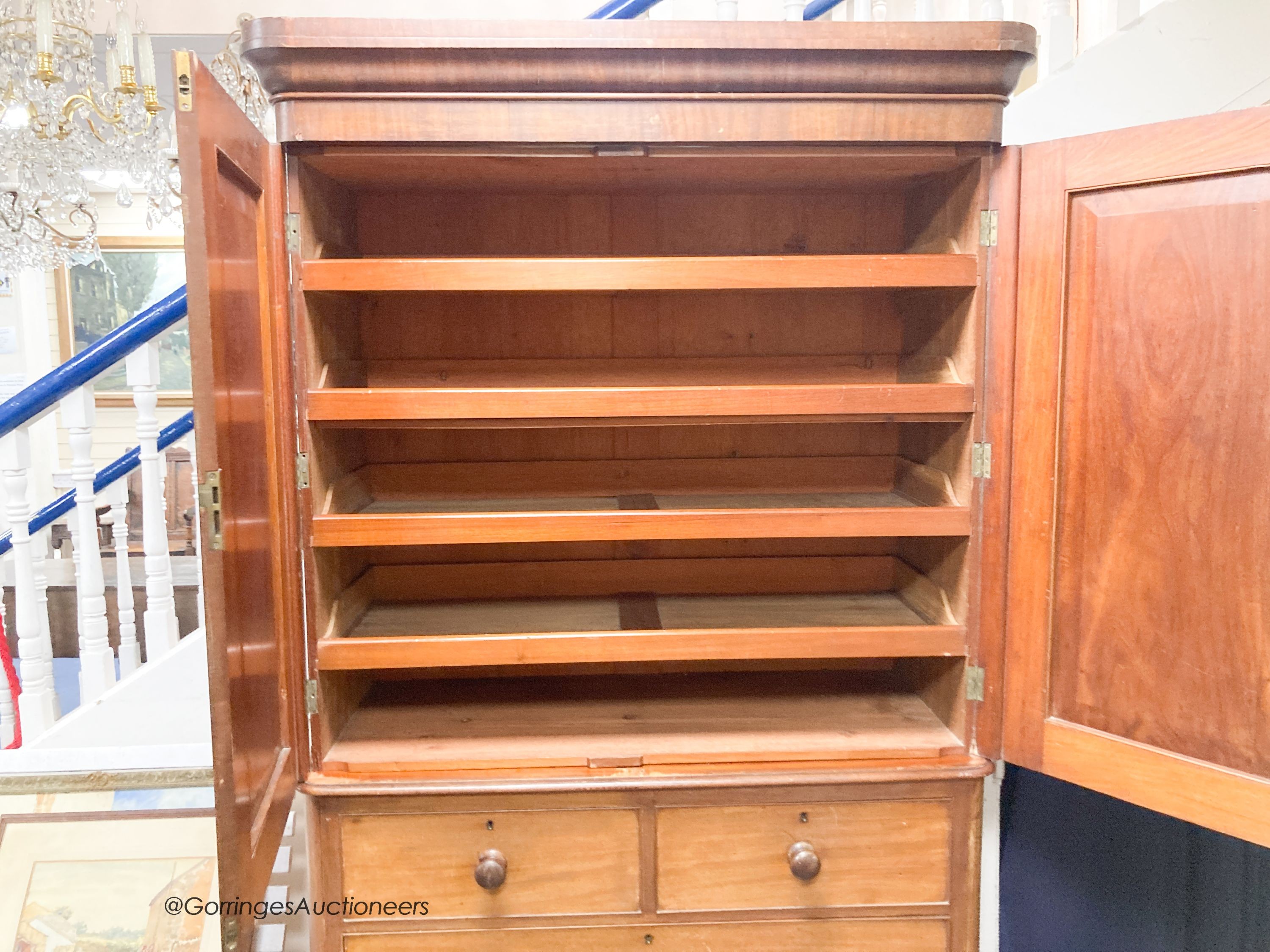 A late Victorian mahogany linen press, length 122cm, depth 55cm, height 209cm